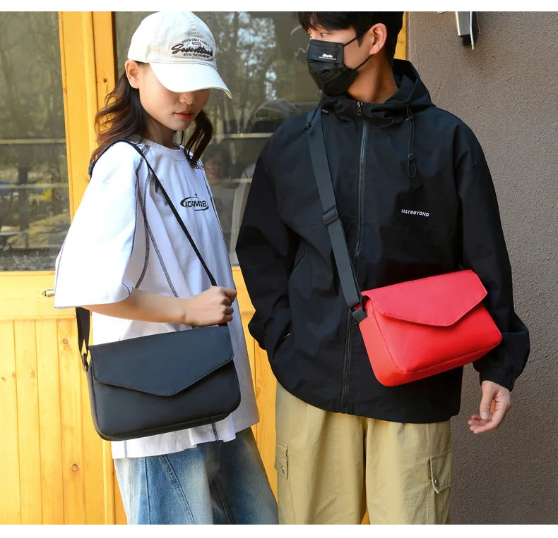 2025 Korean Version of the Sling Shoulder Bag Couple Crossbody Bag Solid Color Leisure Simple Fashion Bags Wholesale Supplier