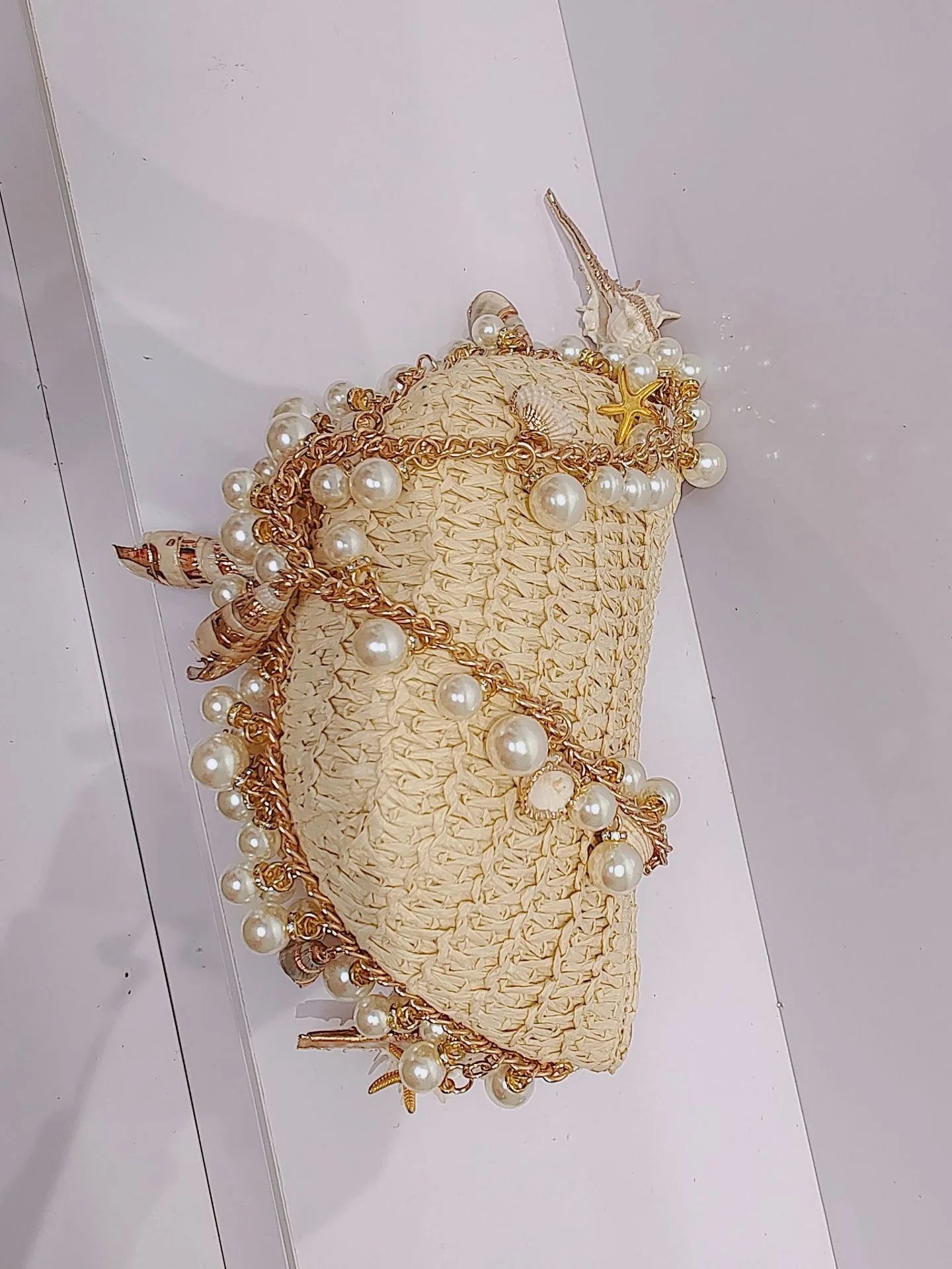 2025 Fashion Spring and Summer Pearl Conch Straw Braided Handbag New Woven Bag with Pu Material