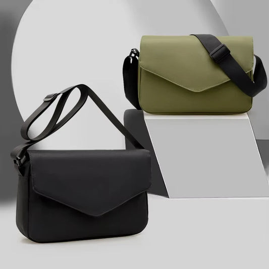 2025 Korean Version of the Sling Shoulder Bag Couple Crossbody Bag Solid Color Leisure Simple Fashion Bags Wholesale Supplier