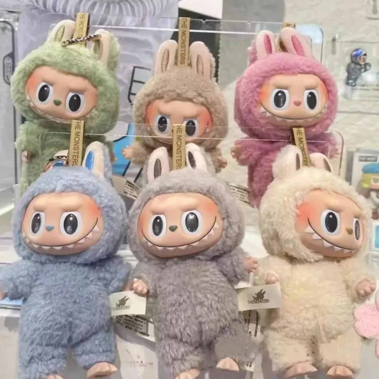 Bonita caja de juguete Labubu The Monsters, muñeco de vinilo con forma de corazón, mochila Kawaii, colgante, decoración, muñeco de peluche, ropa, llavero, regalos